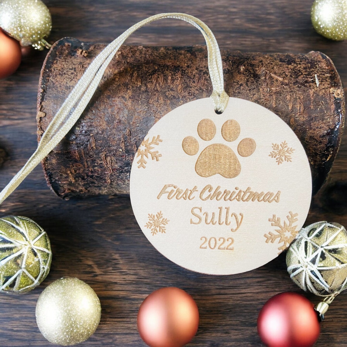 Personalised Wooden Snowflake Dog Paw First Christmas Bauble