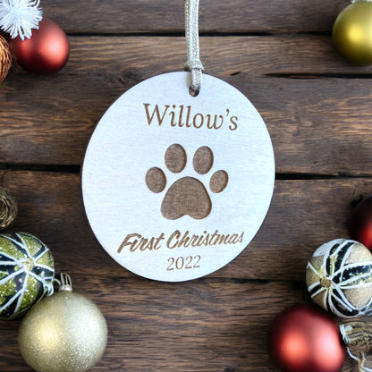 Personalised Wooden Dog Paw First Christmas Bauble