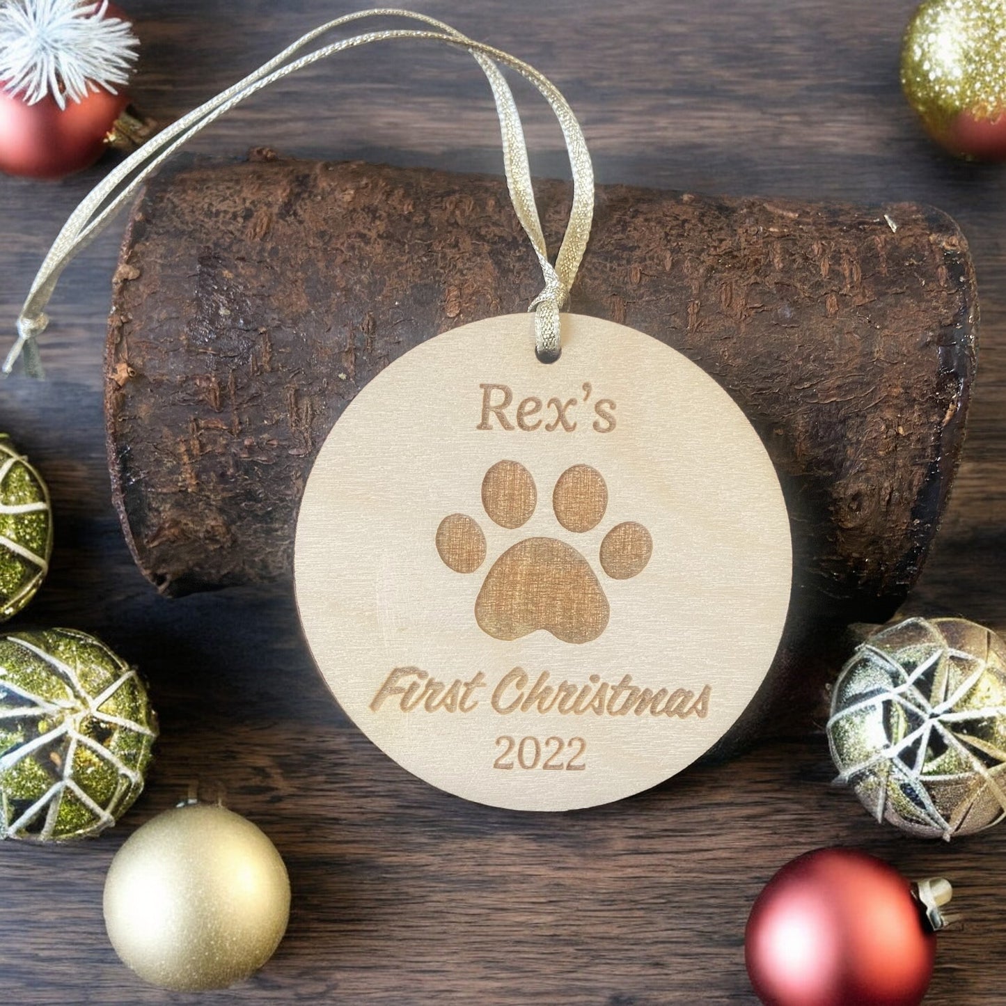 Personalised Wooden Dog Paw First Christmas Bauble