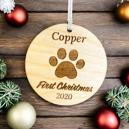 Personalised Wooden Dog Paw First Christmas Bauble