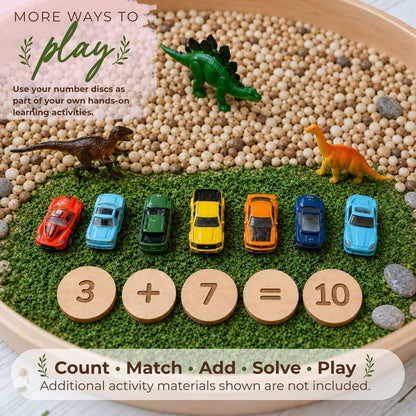 Wooden number game used for a hands-on addition activity with toy cars and dinosaurs